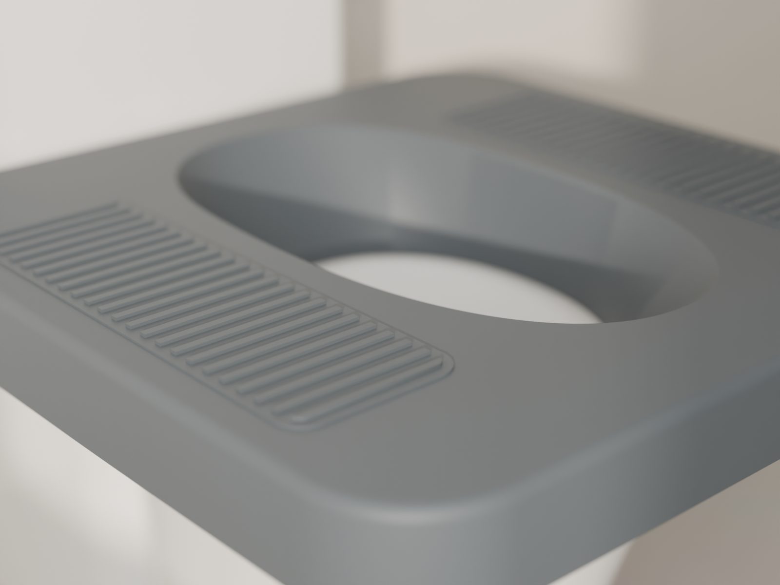Close-up of a Perch Platform: ribbed treads moulded into the charcoal platform beside the long, sloped opening.